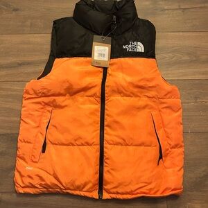 The North Face Orange and Black Puffer Vest